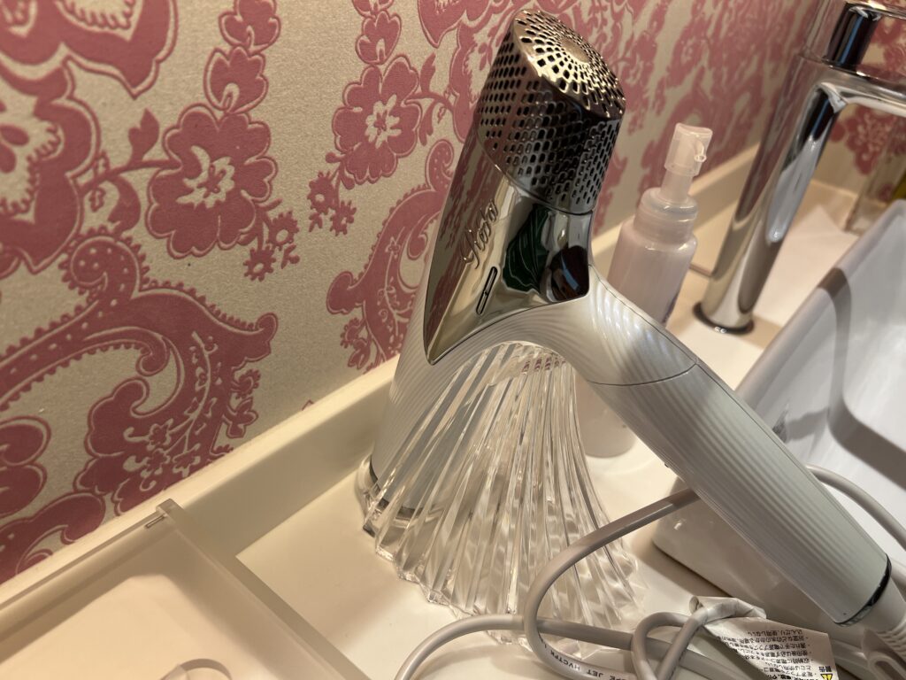 ReFa hair dryer placed on the vanity at Hotel Universal Port Vita Osaka.