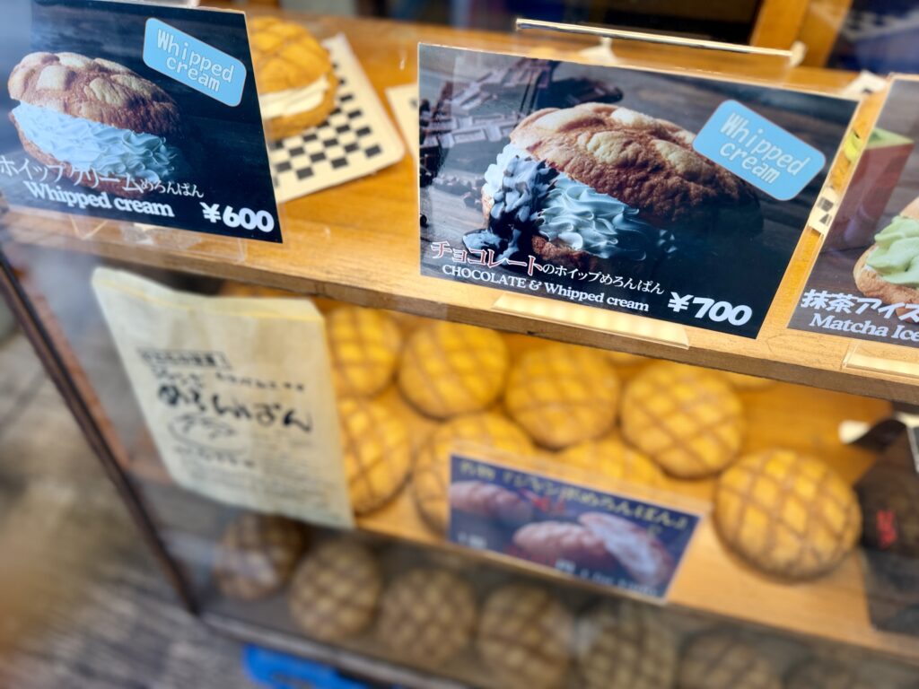 Display of whipped cream and chocolate melon pans at Asakusa Kagetsudo main store