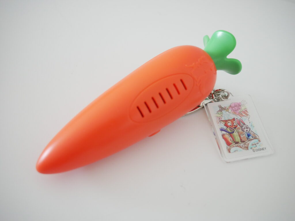 Carrot-shaped Zootopia voice recorder keychain with Judy and Nick charm from Tokyo Disneyland.