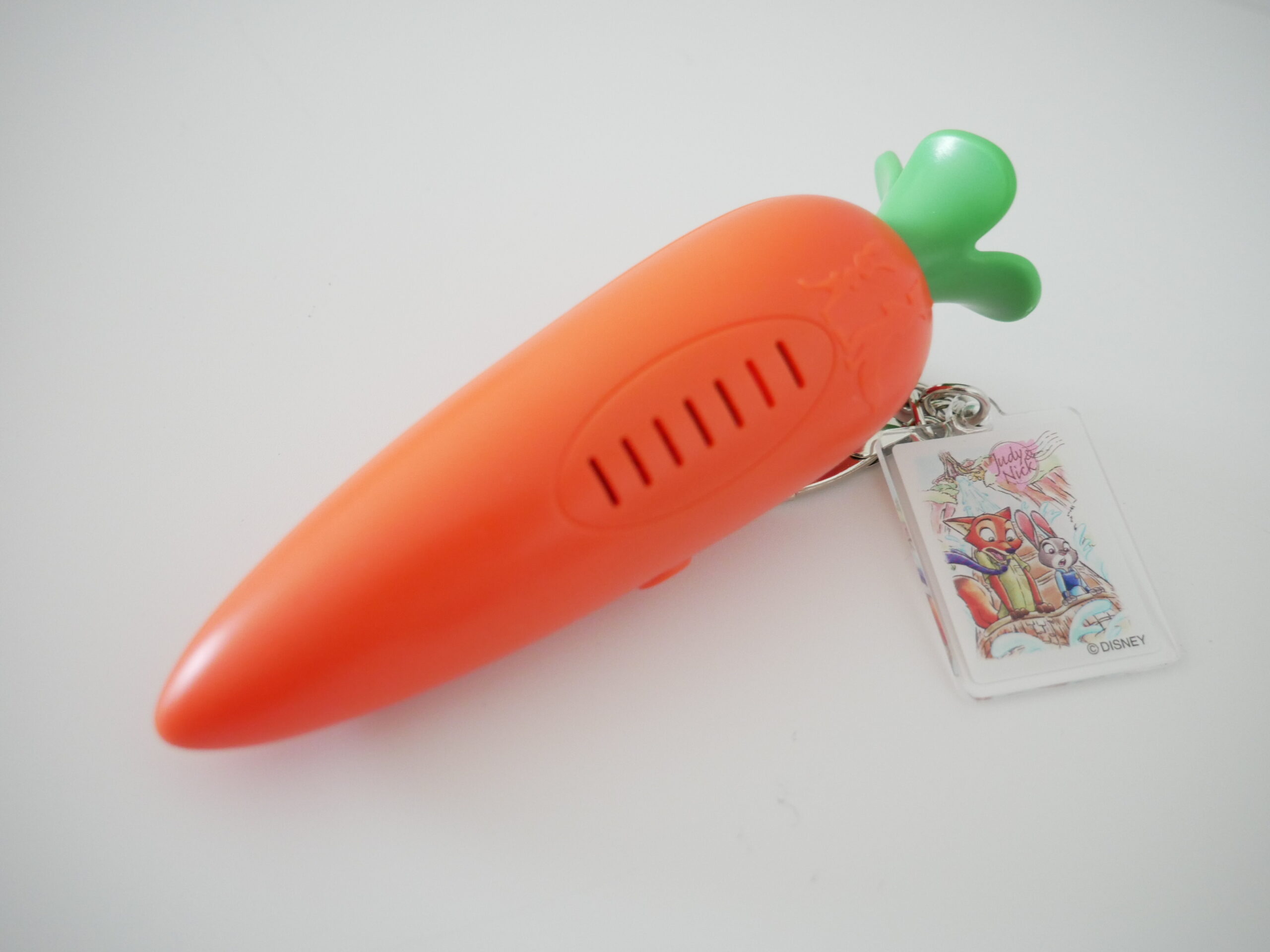 Carrot-shaped Zootopia voice recorder keychain with Judy and Nick charm from Tokyo Disneyland.