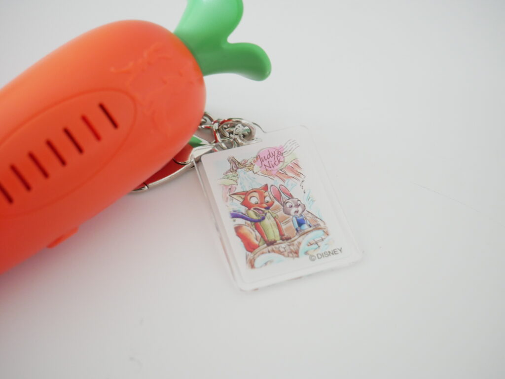 Judy and Nick acrylic charm attached to the Zootopia carrot voice recorder keychain from Tokyo Disneyland.