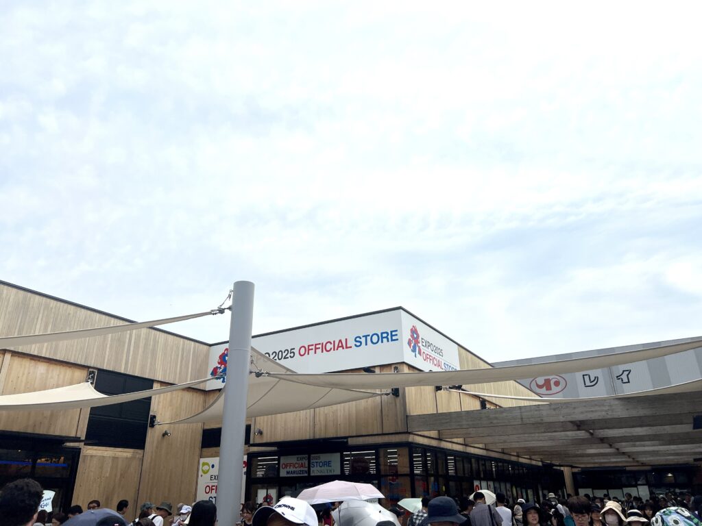Expo 2025 official goods store with long queues at opening