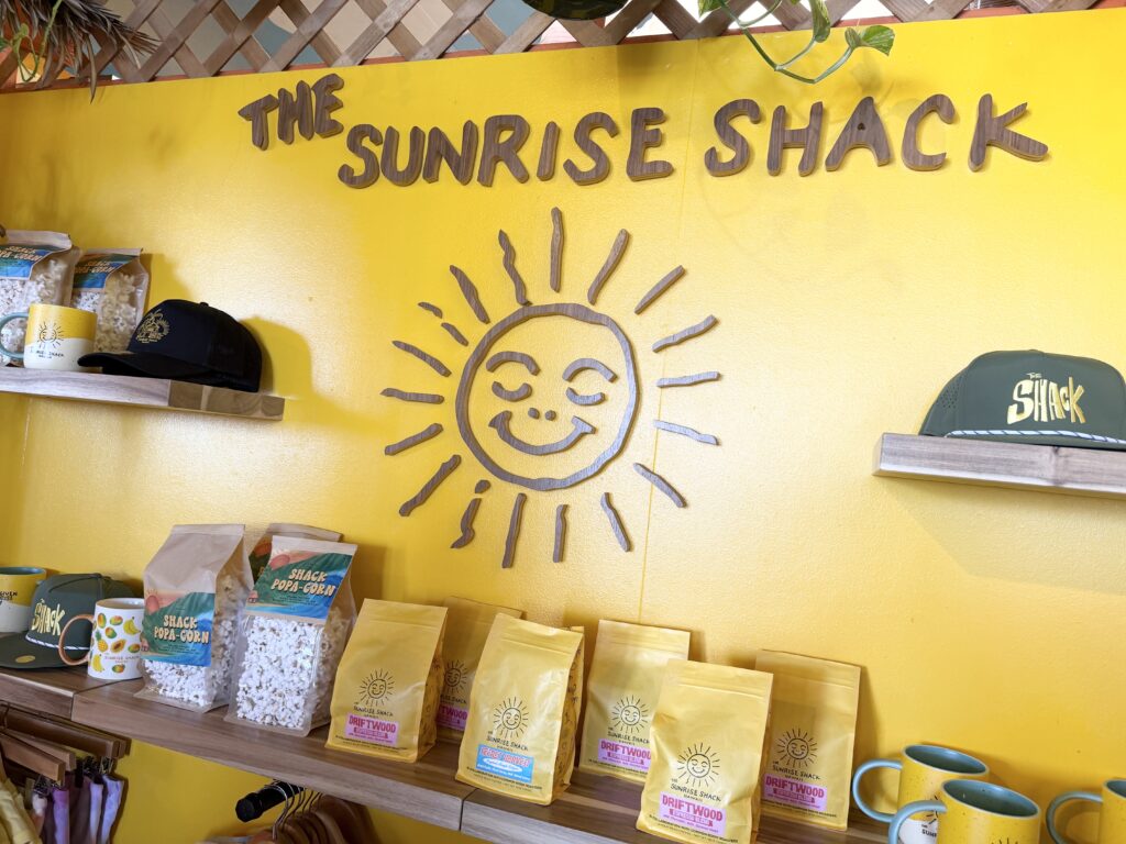 sunrise shack hawaii interior yellow wall logo waikiki