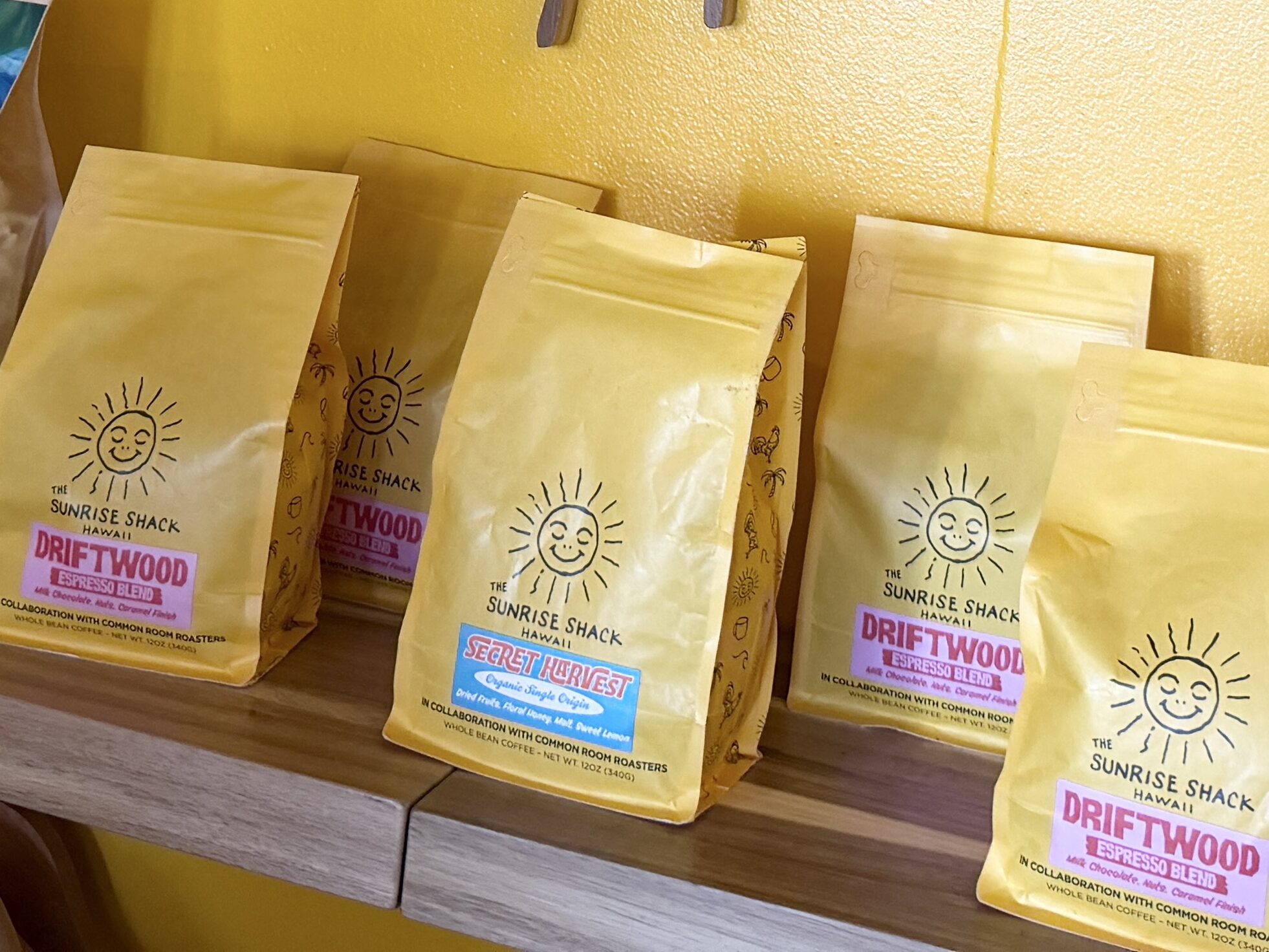 sunrise shack hawaii interior yellow wall logo waikiki